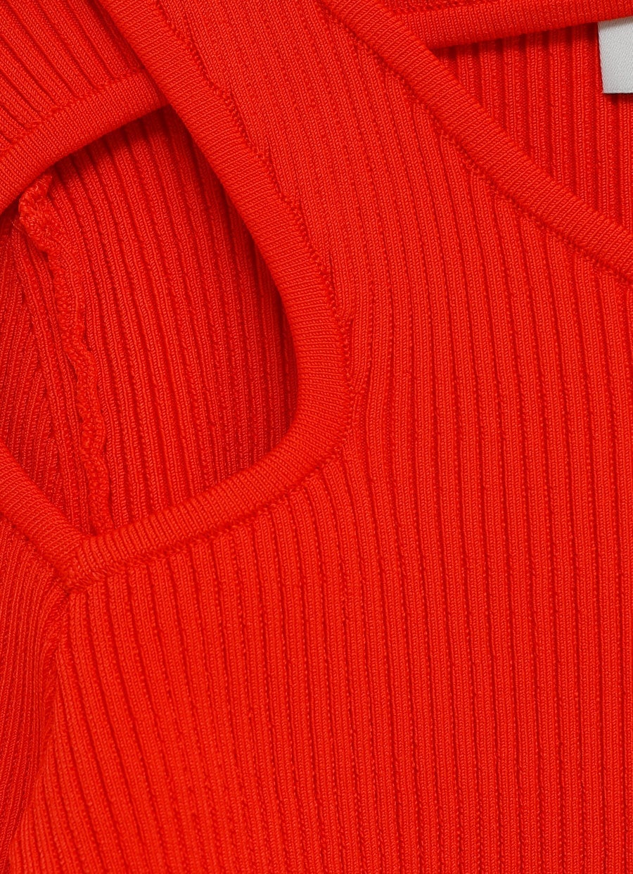 Jersey de canalé con aberturas curvadas