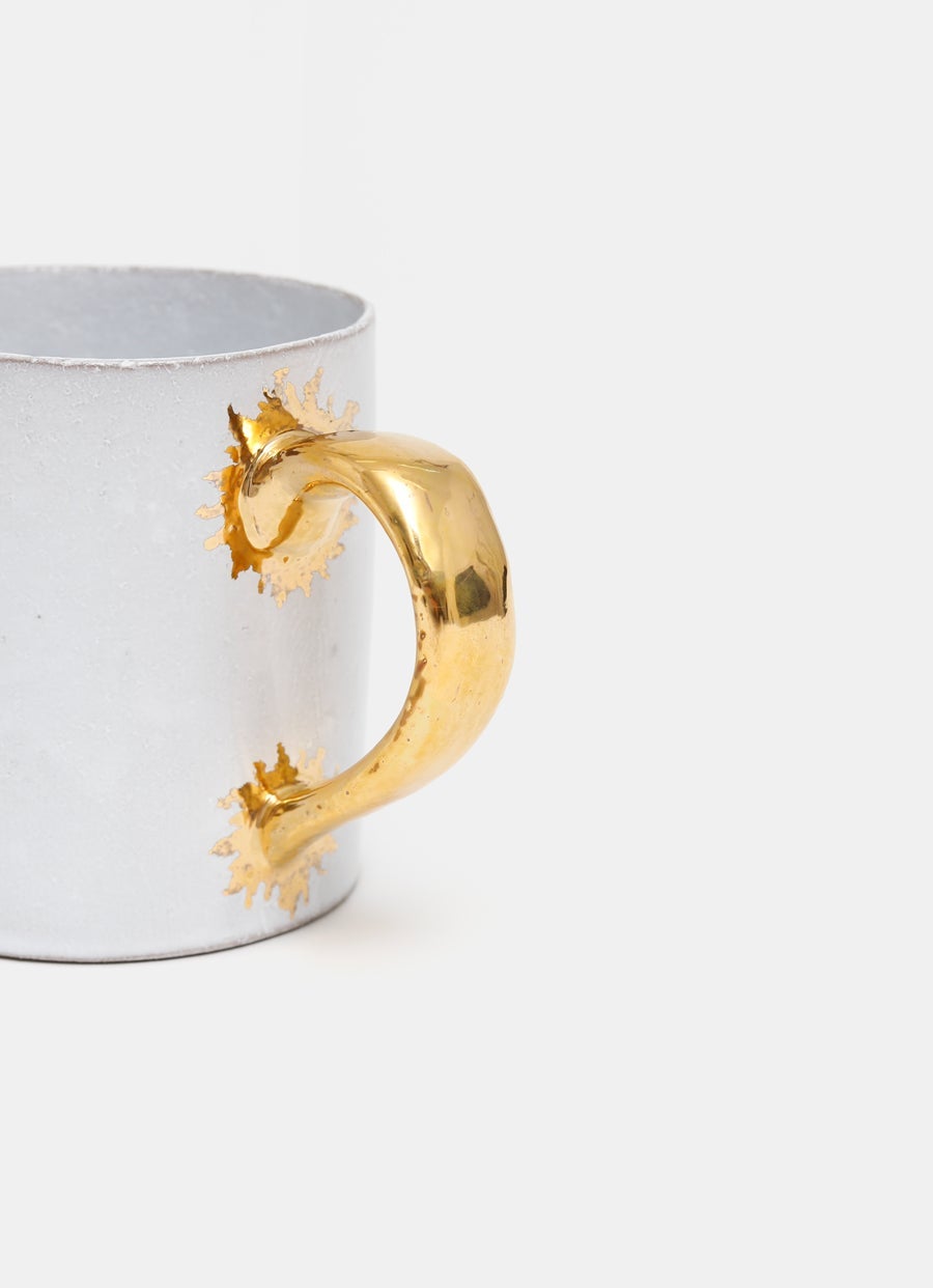 Taza Sacai – asa dorada