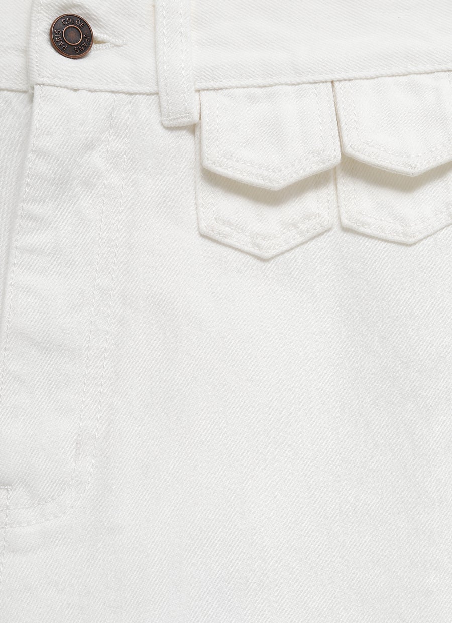 Vaqueros acampanados de talle alto