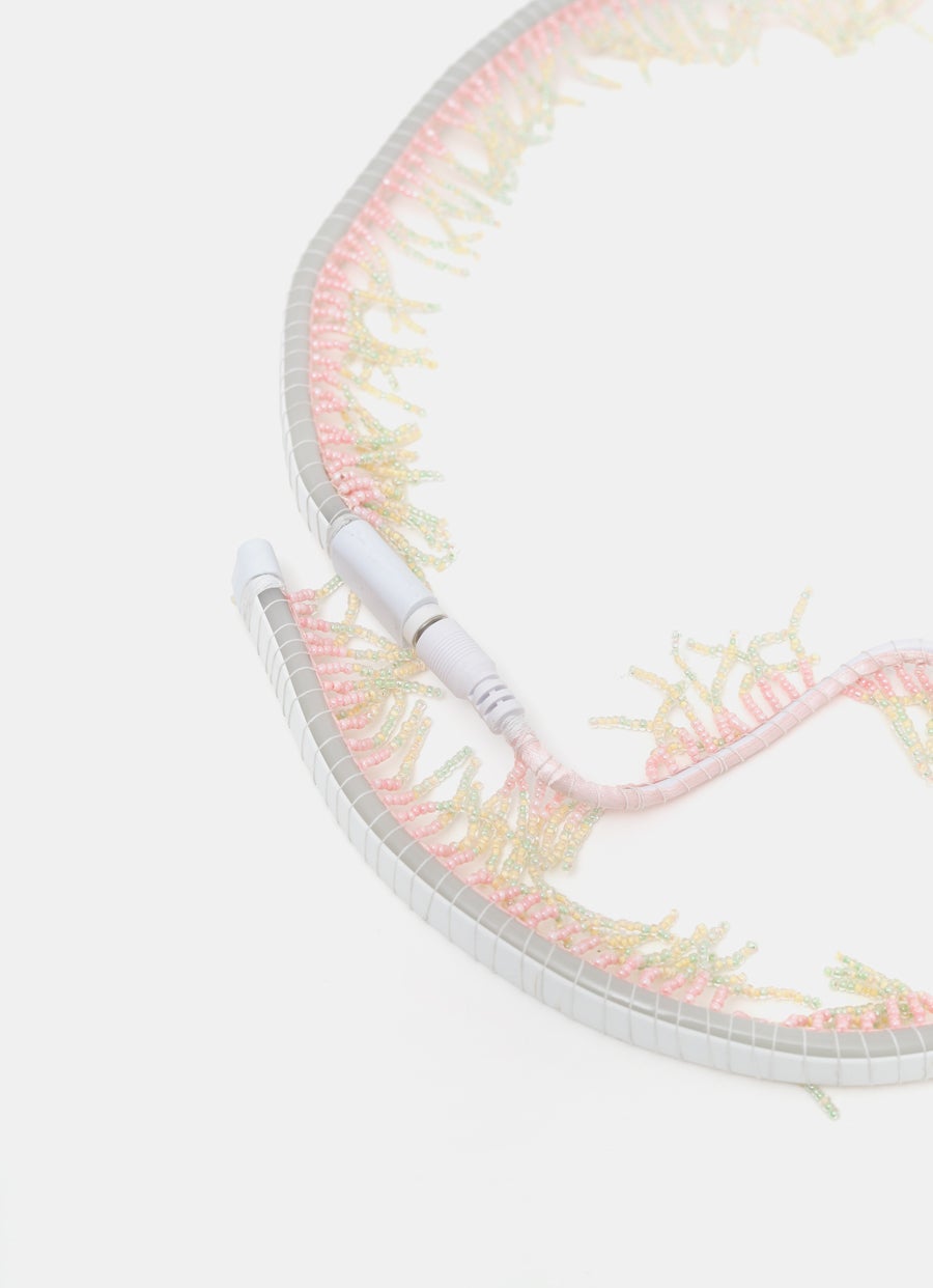 Cable luminoso con fleco de cuentas