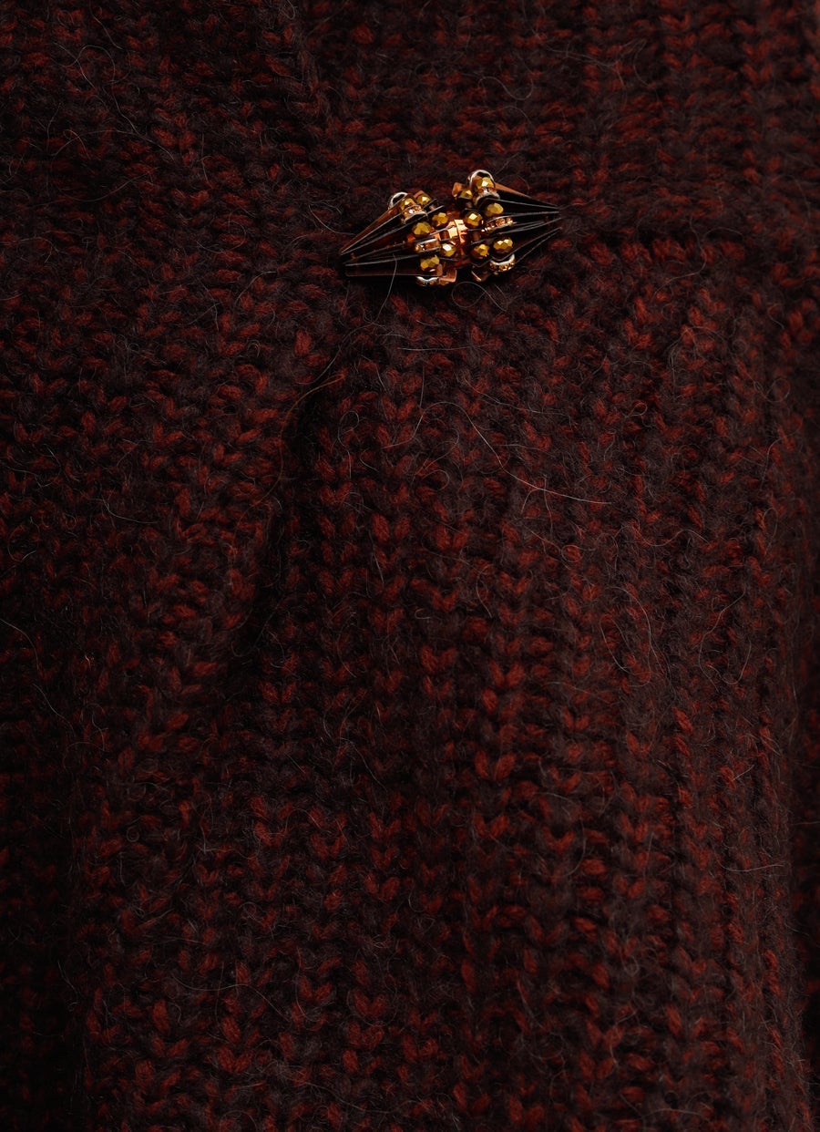 Jersey con detalle de pedrería