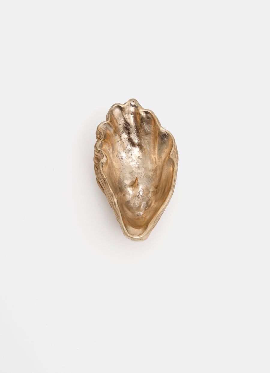 Candelero con forma de ostra