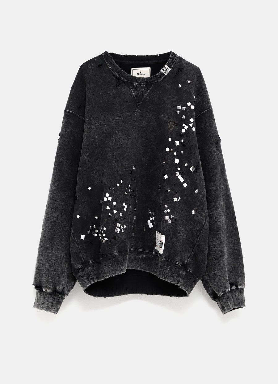 Sudadera con apliques