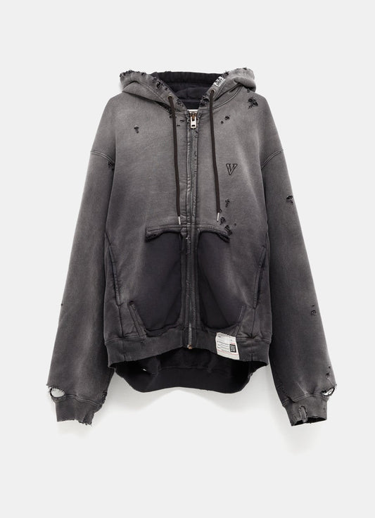 Sudadera descolorida con capucha