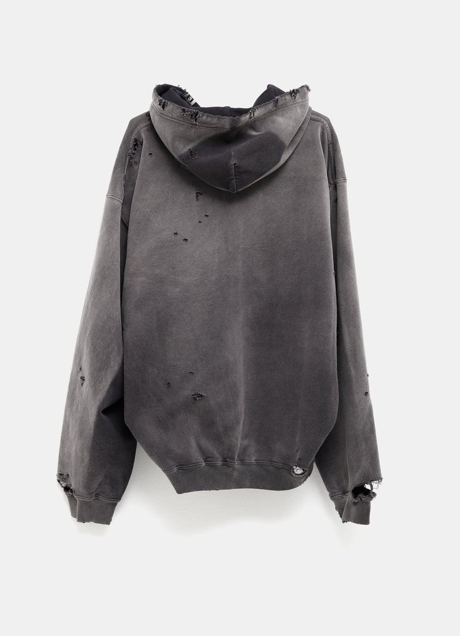 Sudadera descolorida con capucha