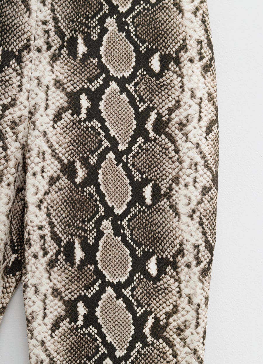 Pantalón acampanado con estampado de serpiente