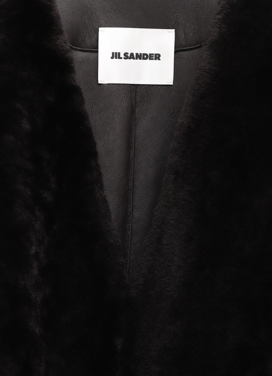 Top de piel de cordero y lana