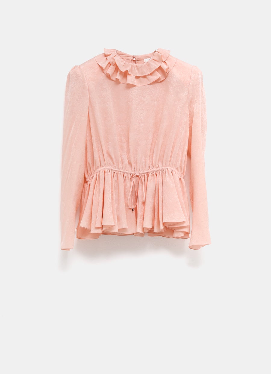 Top fluido con mangas abullonadas