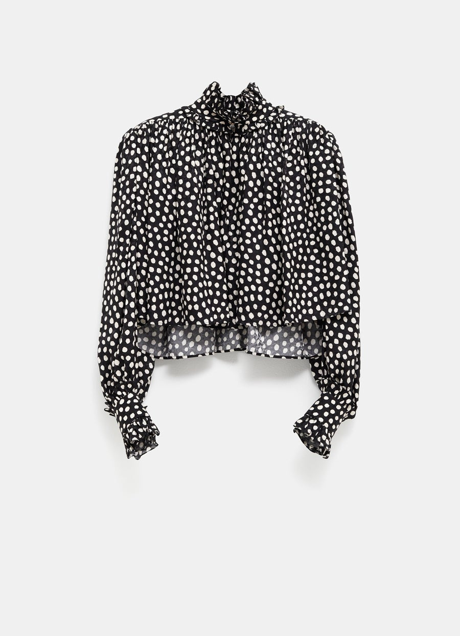 Blusa de lunares con volantes