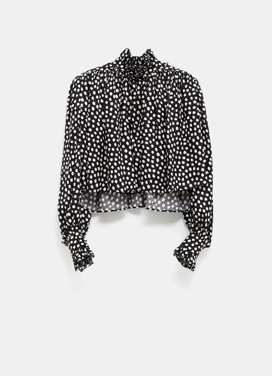 Blusa de lunares con volantes