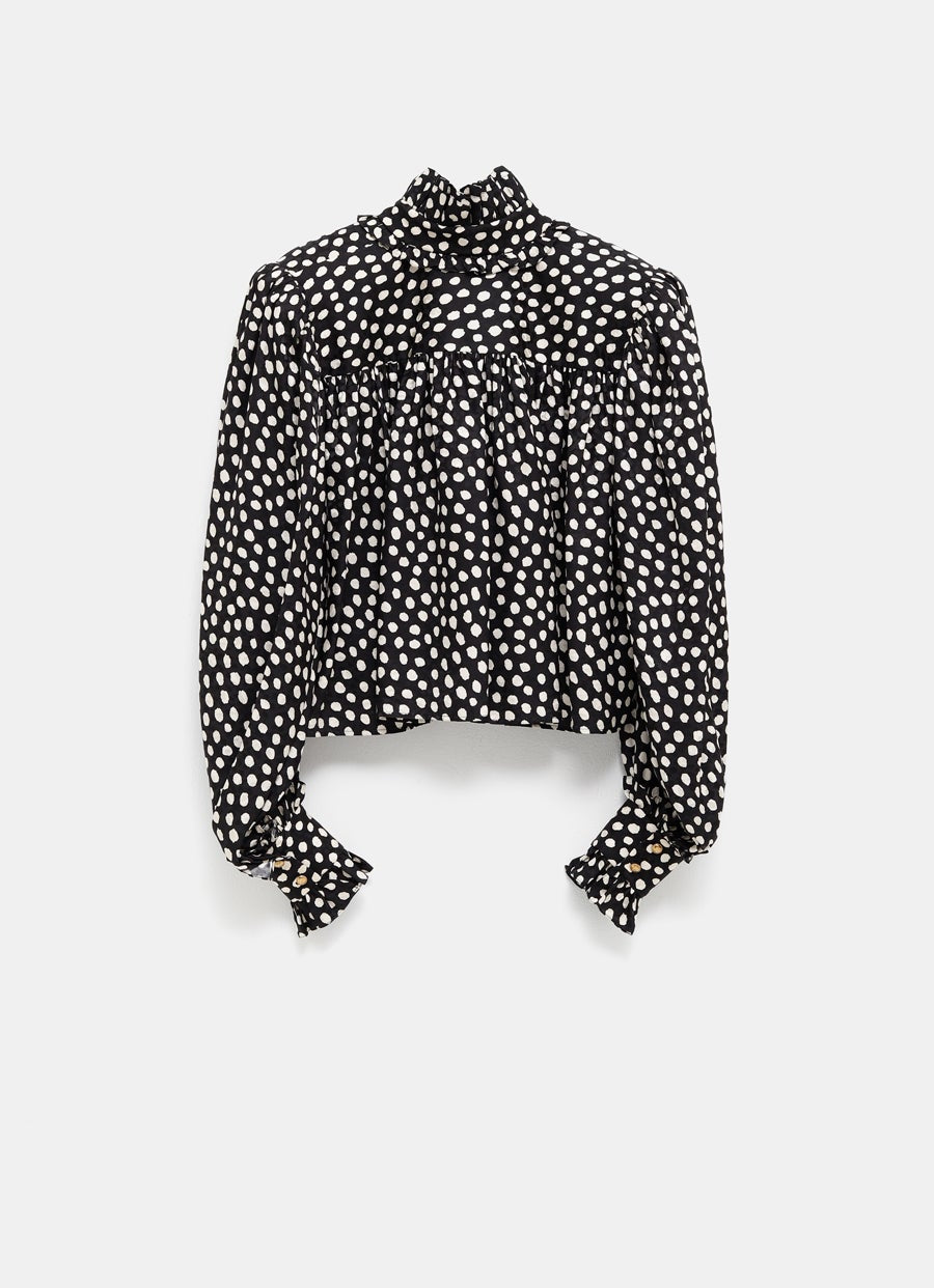 Blusa de lunares con volantes