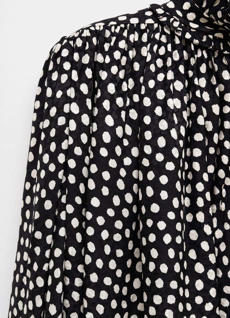 Blusa de lunares con volantes