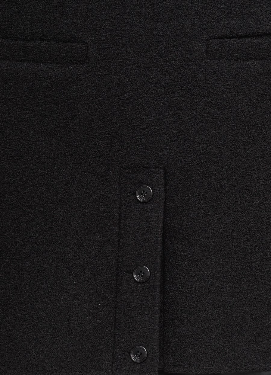 Minifalda en tweed con botones