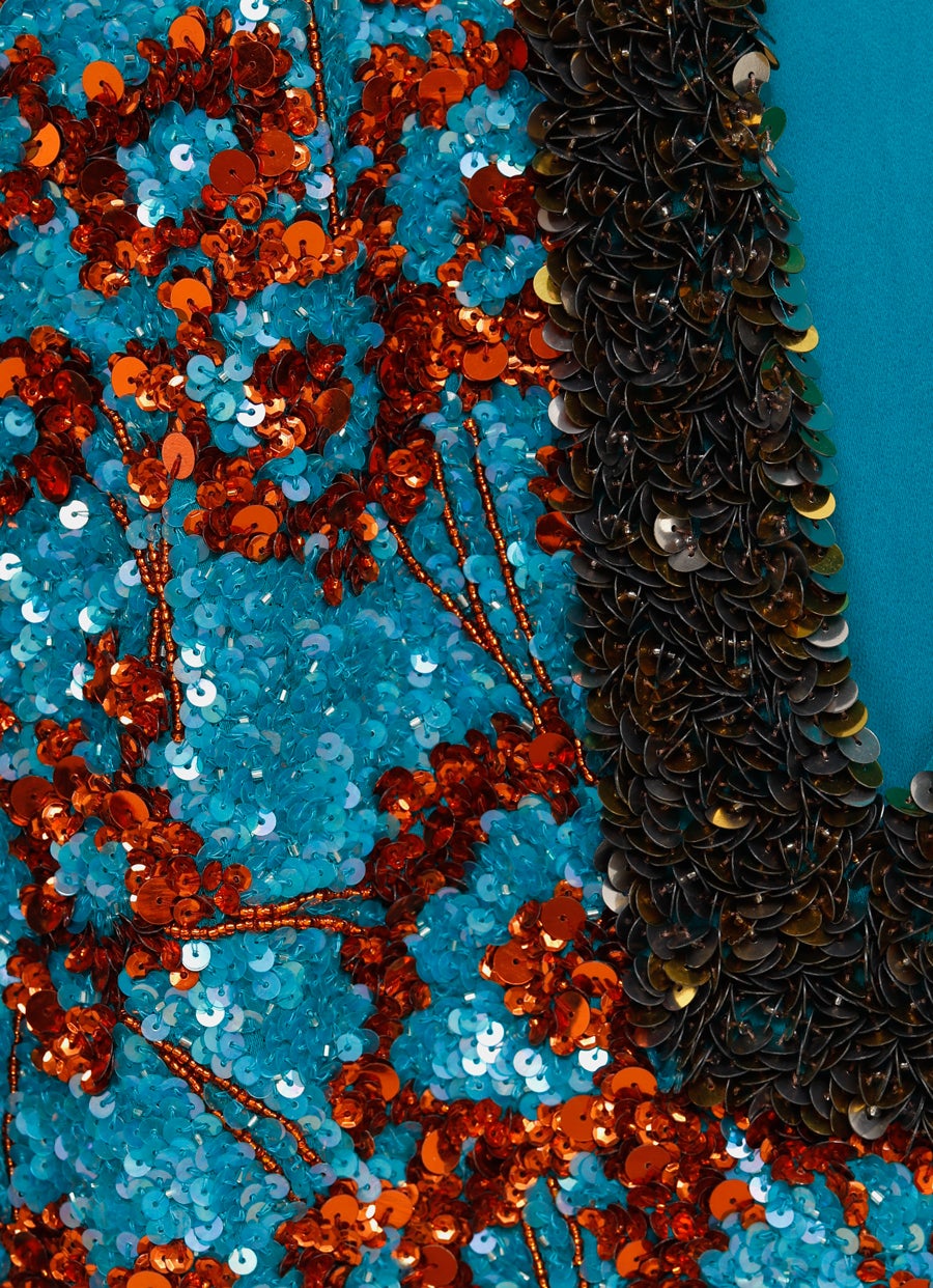 Top sin mangas con lentejuelas