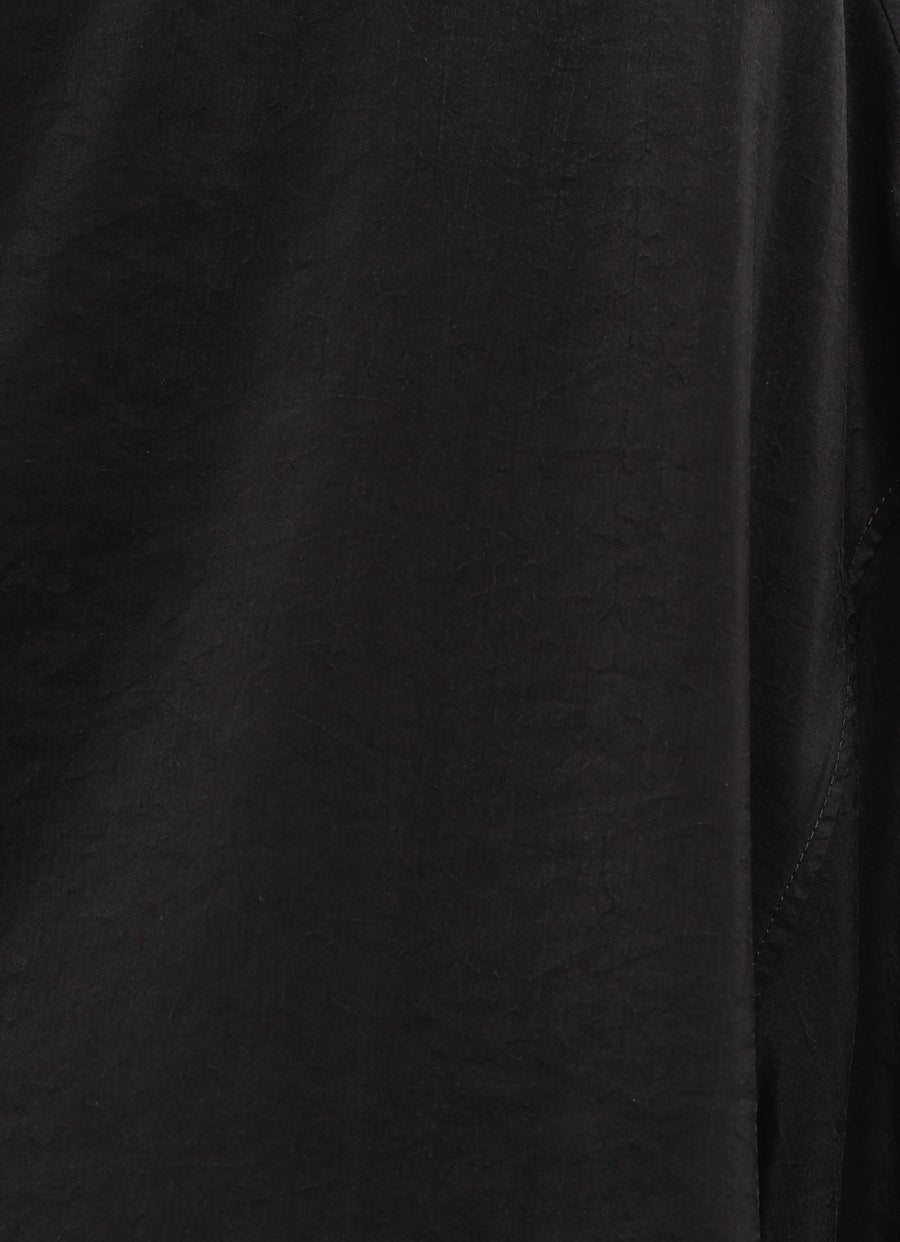 Top con cuello asimétrico