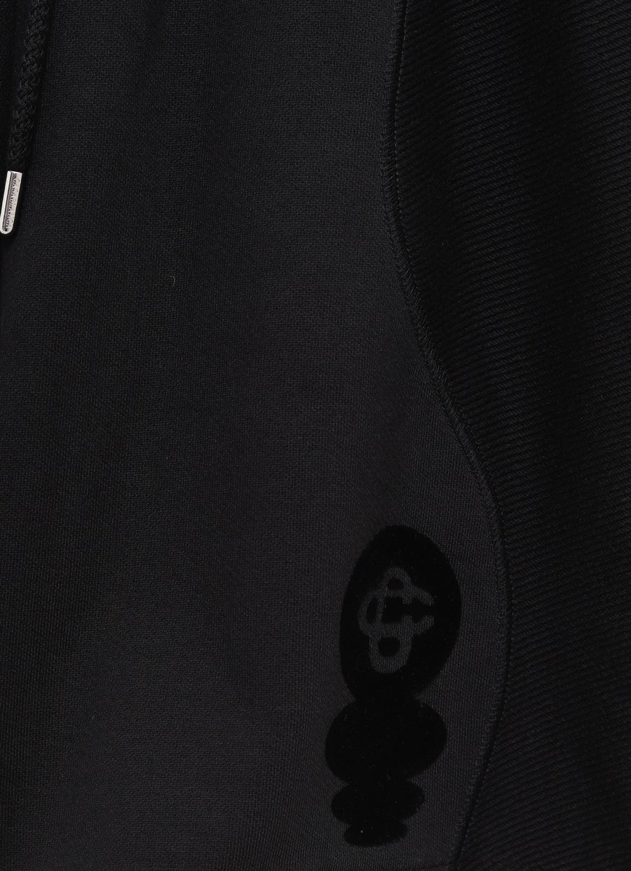 Pantalón corto Squash Logo Flock