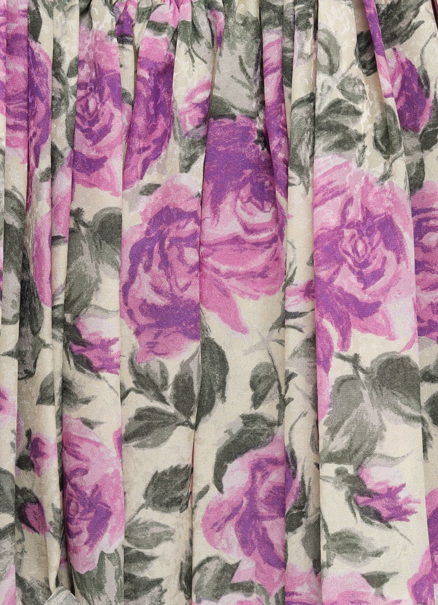 Top corto con manga abullonada