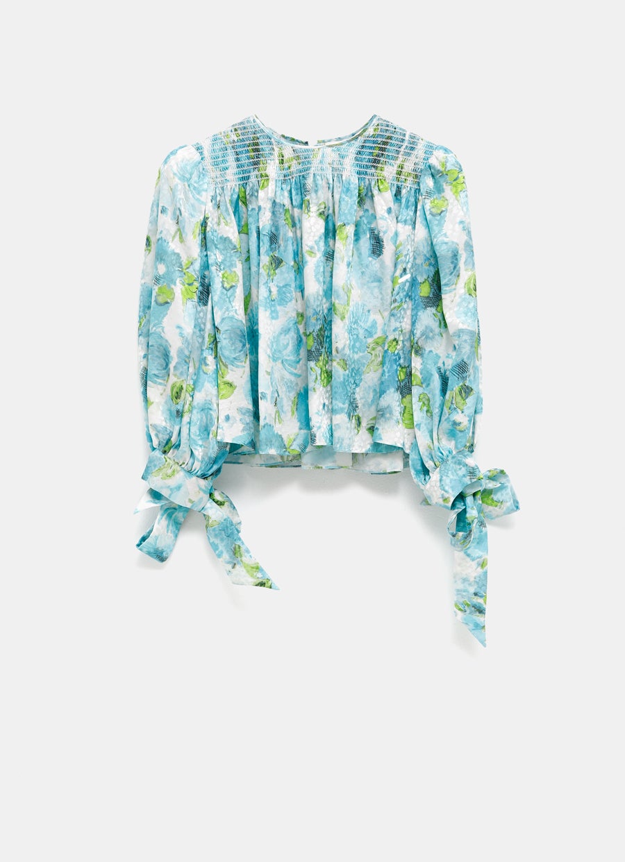 Top corto con manga anudada