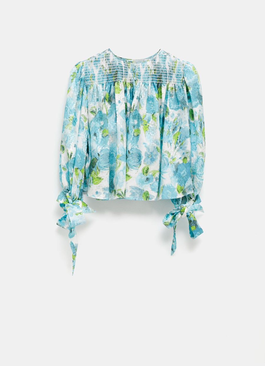 Top corto con manga anudada