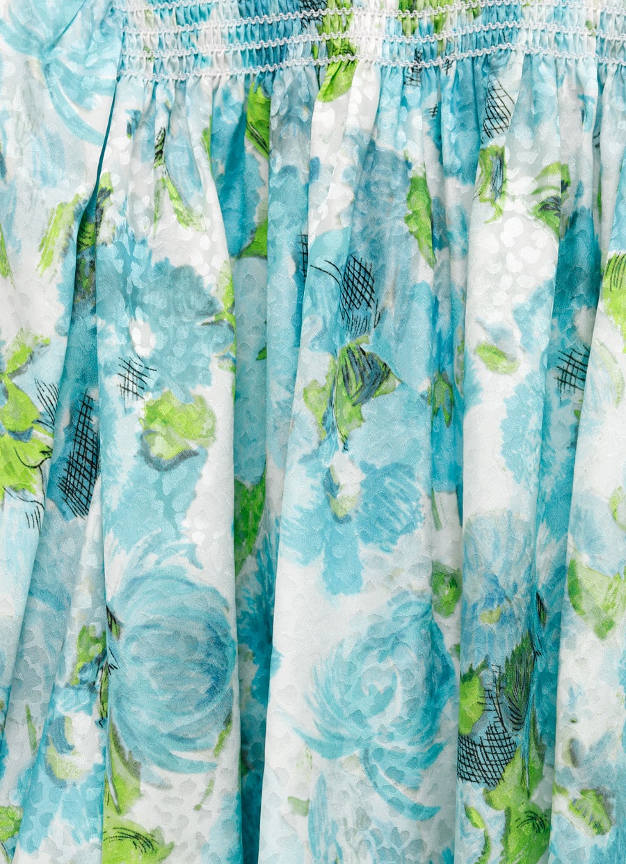 Top corto con manga anudada