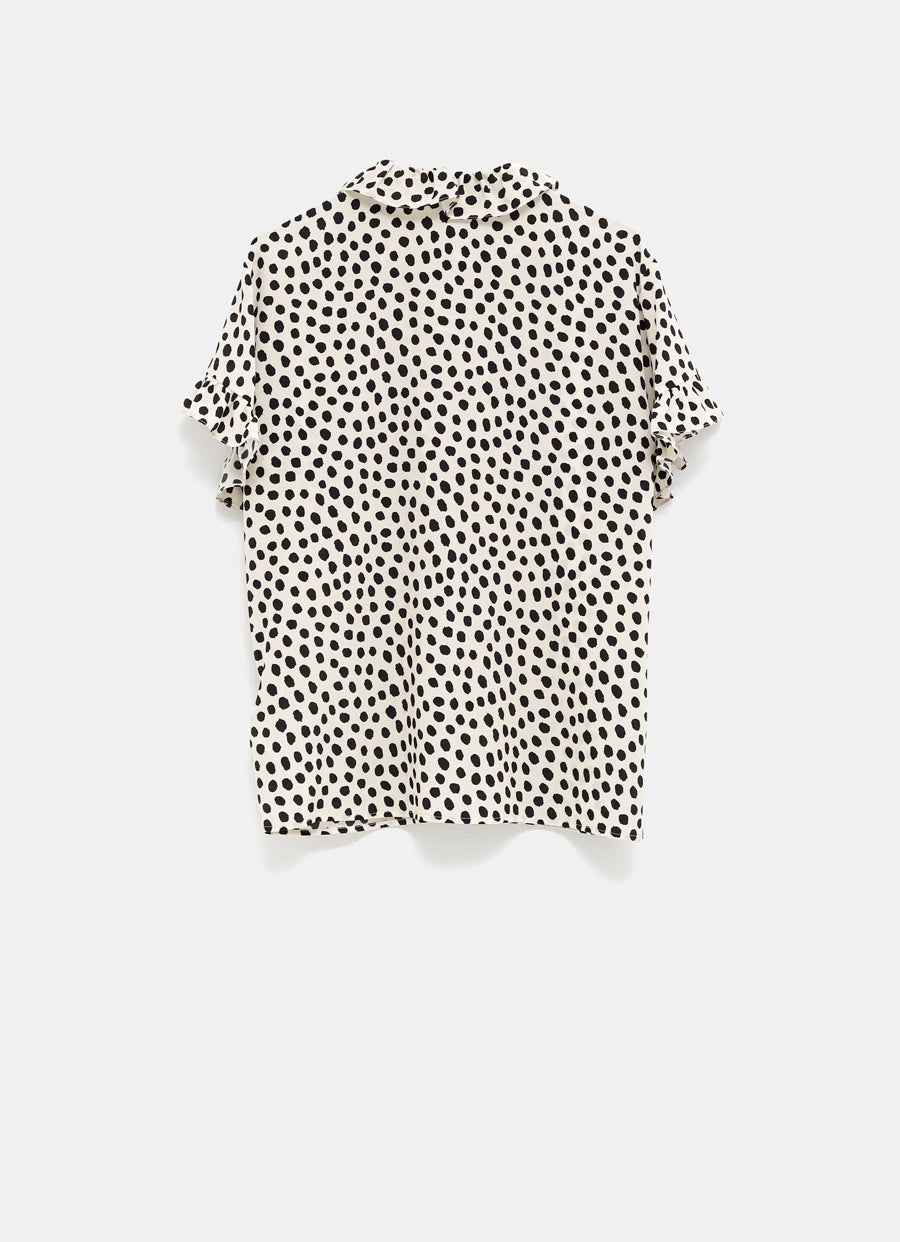 Blusa de lunares con volantes