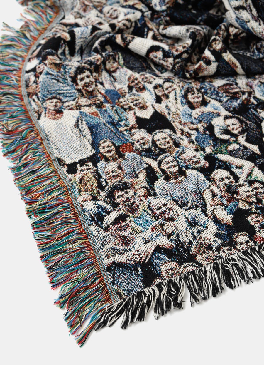 Manta Raush Faces con flecos