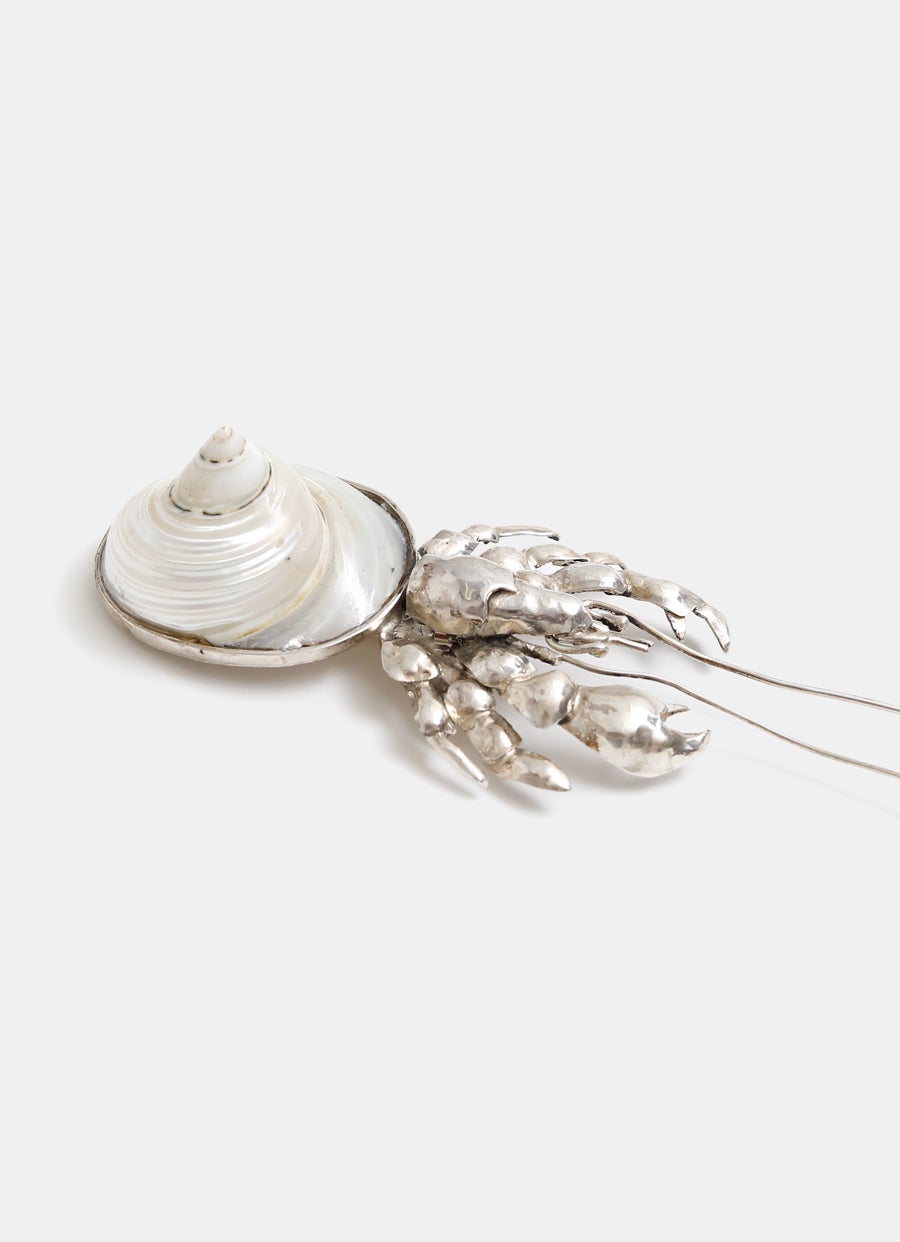 Broche cangrejo ermitaño