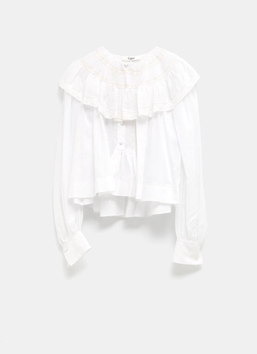 Top cropped con volantes