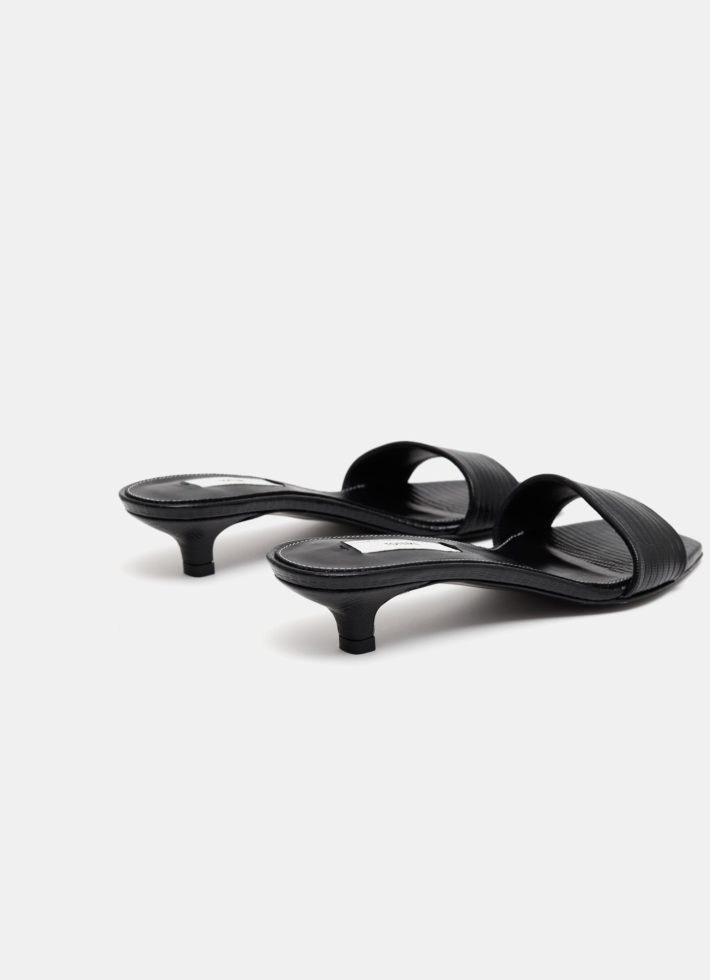 Mules de tacón con textura de lagarto