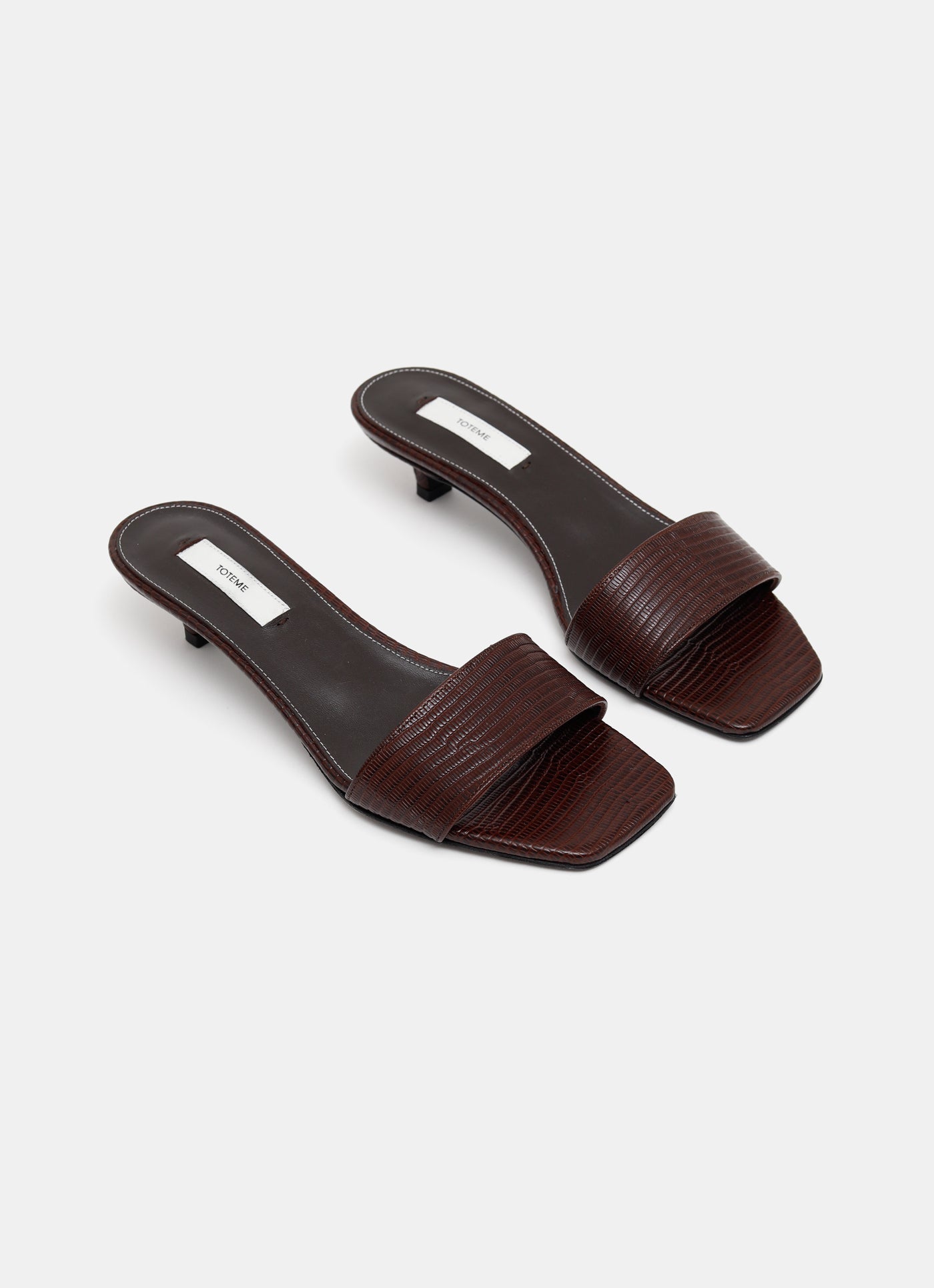 Mules de tacón con textura de lagarto