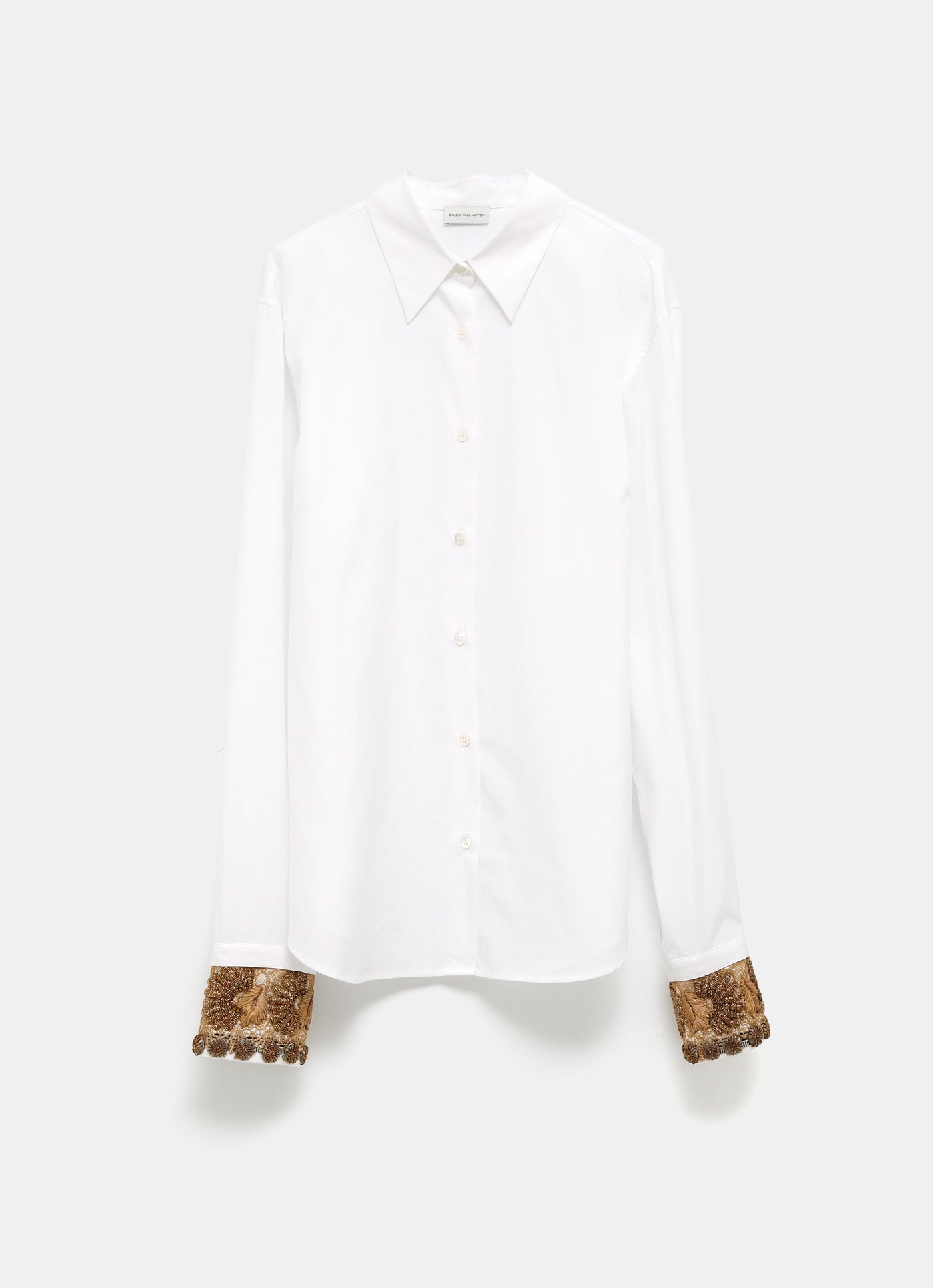 Camisa con puños de pedrería