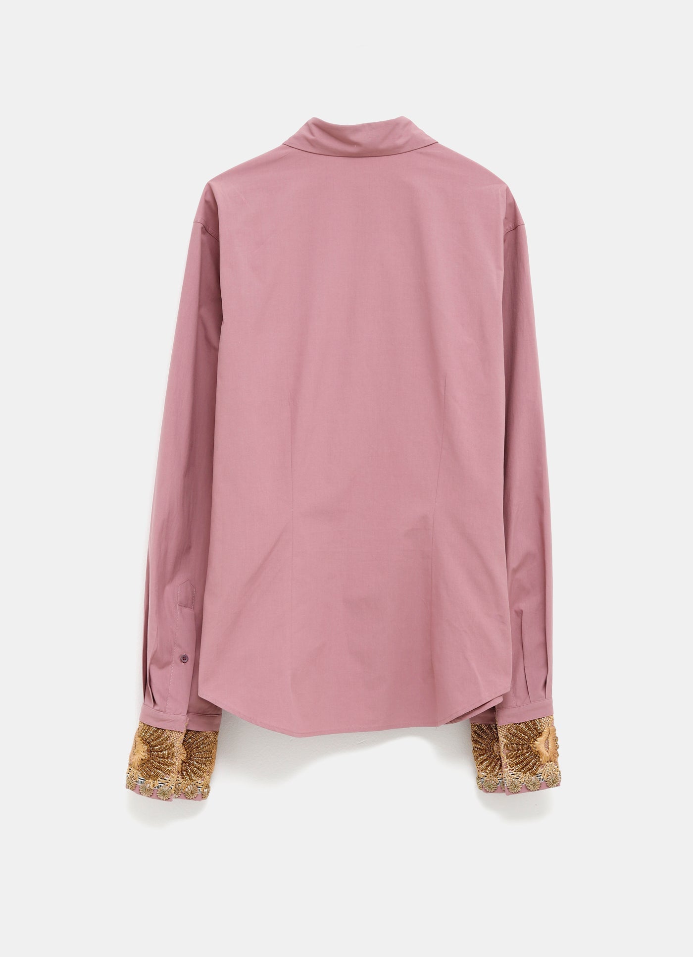 Camisa con puños de pedrería
