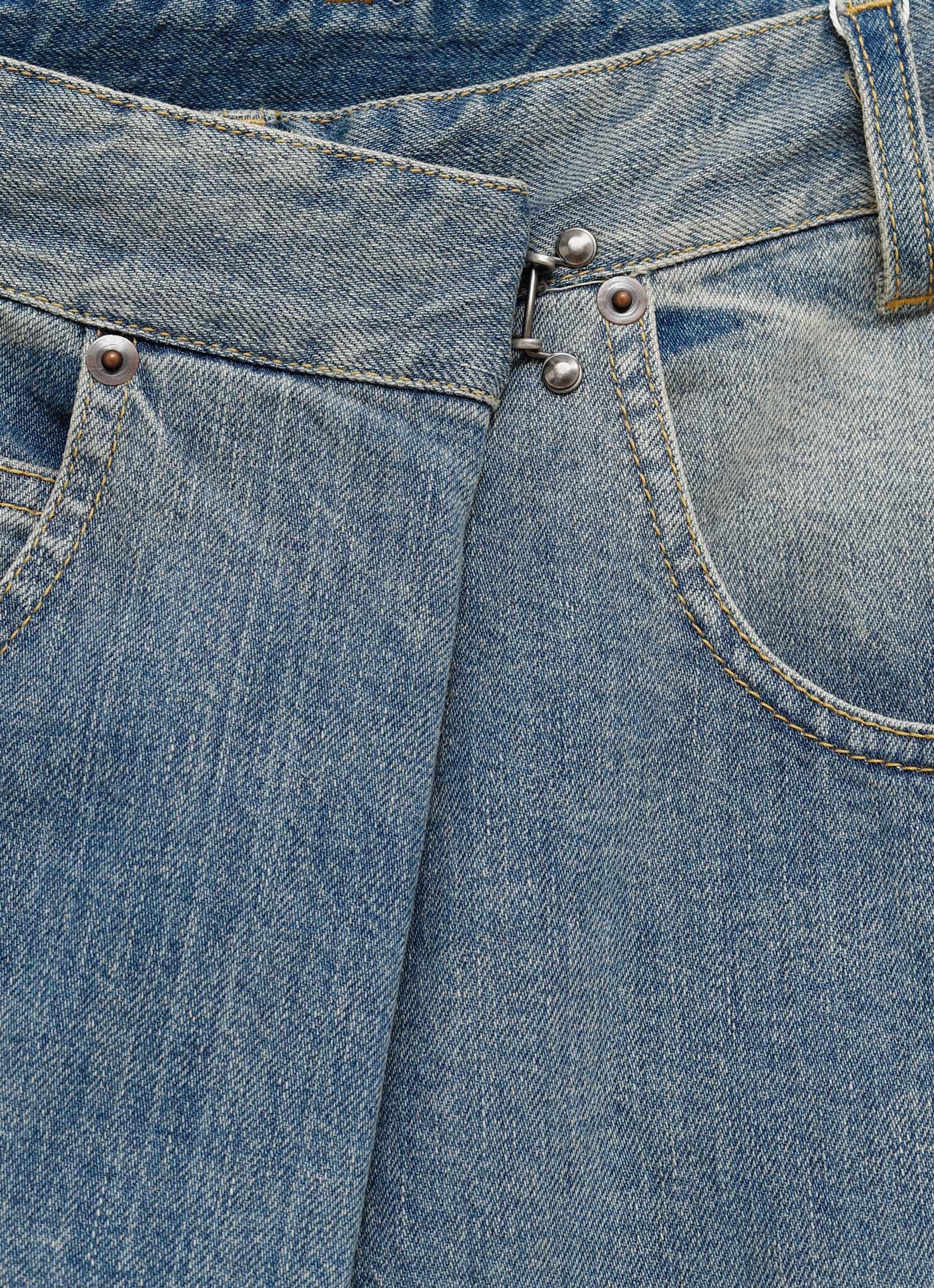 Pantalón vaquero cruzado para mujer
